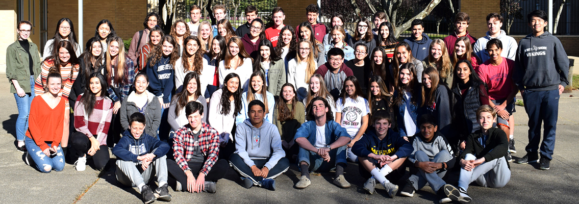 a large group of students posing for picture